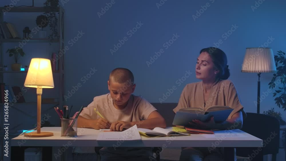 custom made wallpaper toronto digitalA schoolboy sits at a table in a room doing homework.