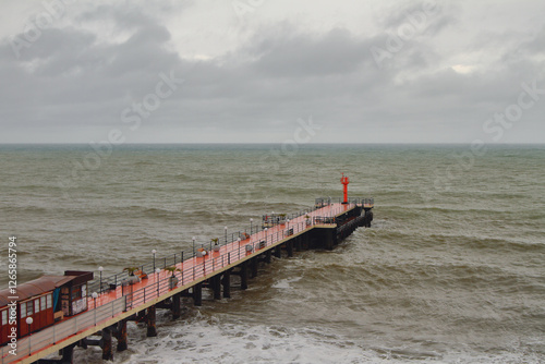 Obraz na płótnie Pier and sea in bad weather. Adler, Sochi, Russia w salonie