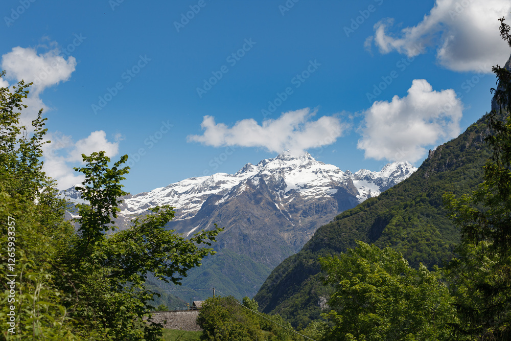 Snow-capped Bergamo alps. View from Gromo town.