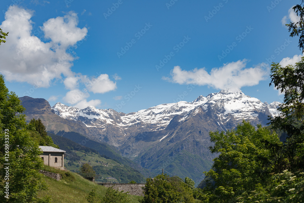 Snow-capped Bergamo alps. View from Gromo town.