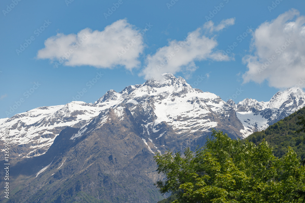 Snow-capped Bergamo alps. View from Gromo town.