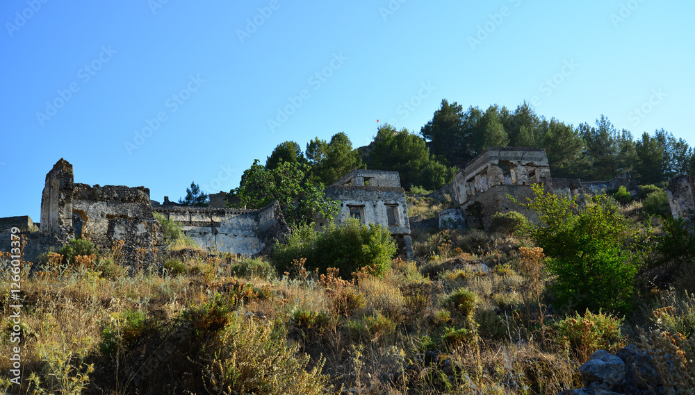 Historical Kayakoy, located in Fethiye, Turkey, is an old Greek settlement with abandoned houses and churches. Historical Kayakoy, located in Fethiye, Turkey, is an old Greek settlement with abandoned houses and churches.