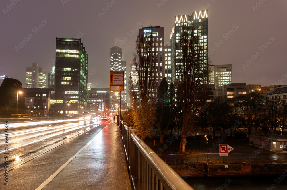 Fototapeta premium Urban street scene in Frankfurt am Main, Germany at night