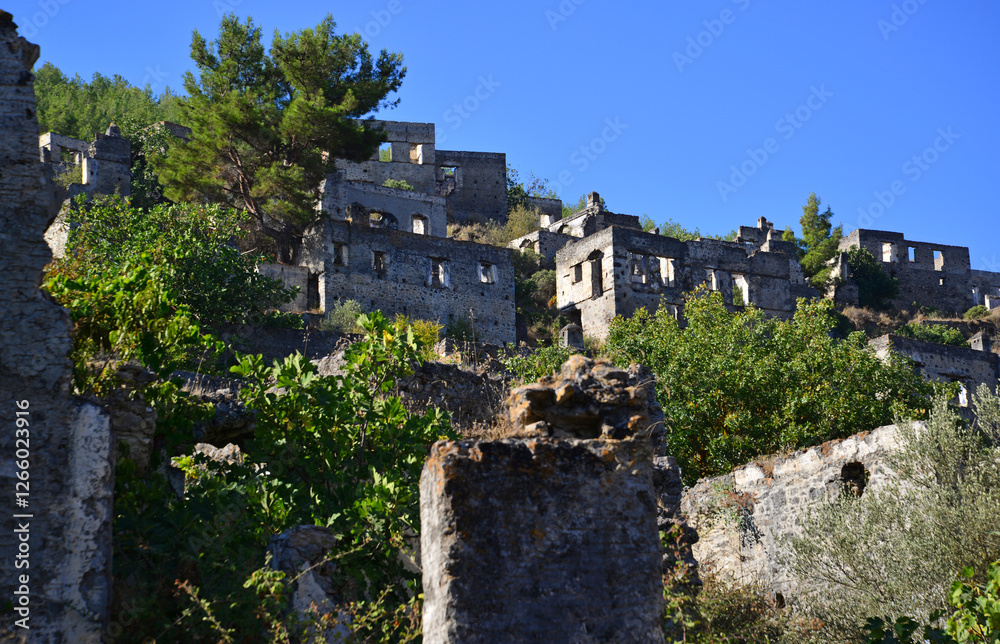 Historical Kayakoy, located in Fethiye, Turkey, is an old Greek settlement with abandoned houses and churches. Historical Kayakoy, located in Fethiye, Turkey, is an old Greek settlement with abandoned houses and churches.