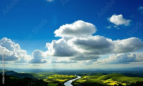 clouds over the green field