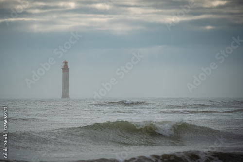 Chauveau lighthouse, isle of Re, during storm. this lighthouse is one of the famous lighthouses near La Rochelle, France