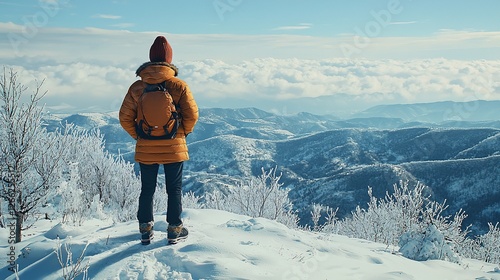 Hiker winter mountain peak snowy landscape travel