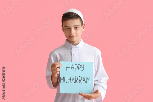 Little Muslim boy with gree...