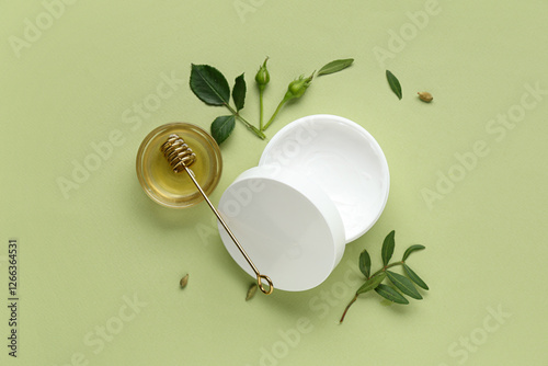 Open jar of natural face cr...