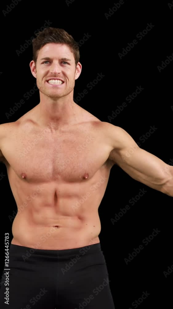 Muscular man flexing muscles in front of camera Muscular man flexing muscles in front of camera