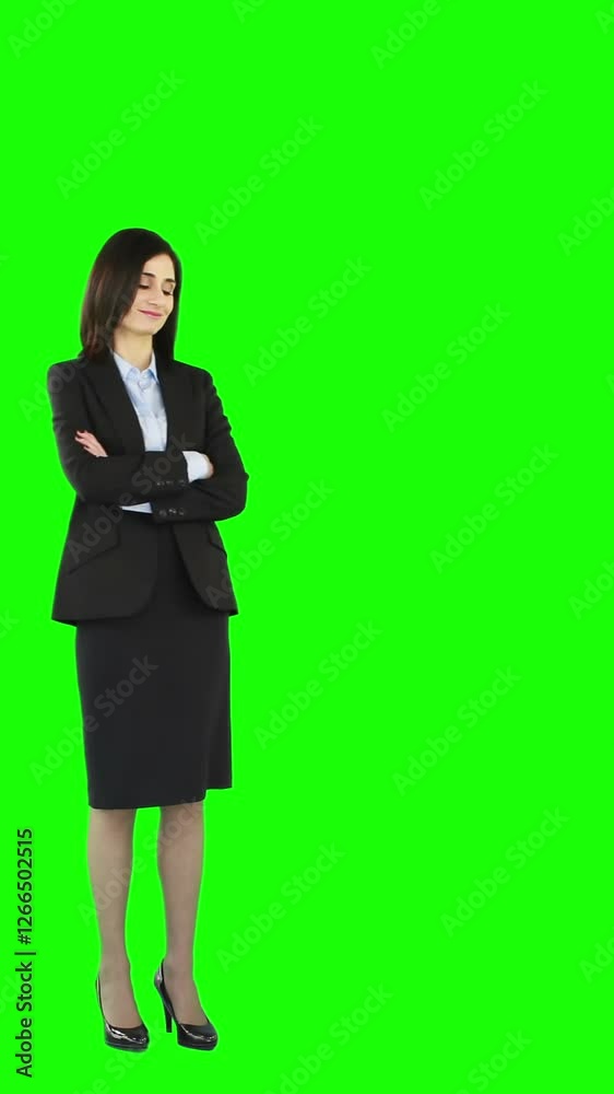 Standing businesswoman with arms crossed Standing businesswoman with arms crossed