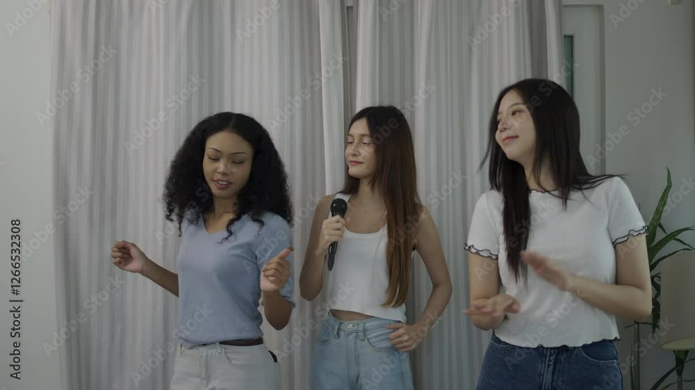 Friendship of young women sing and dance together. Leisure activity, relationship. Friendship of young women sing and dance together. Leisure activity, relationship.
