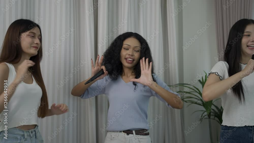 Friendship of young women sing and dance together. Leisure activity, relationship. Friendship of young women sing and dance together. Leisure activity, relationship.