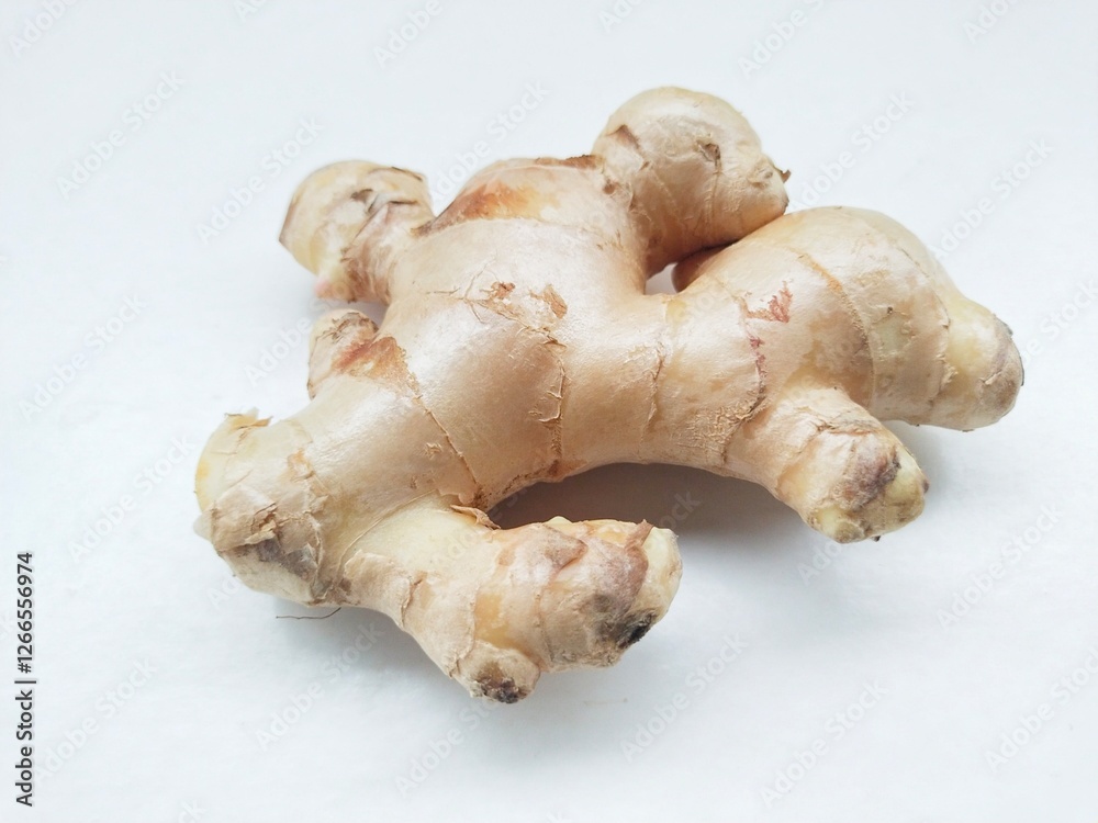 Close-up of ginger (Zingiber Officinale) on a white background. Close-up of ginger (Zingiber Officinale) on a white background.
