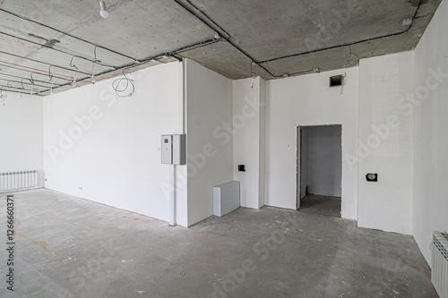 rough repairs for self-finishing. interior decoration, bare walls of the room, stage of construction. interior apartment room