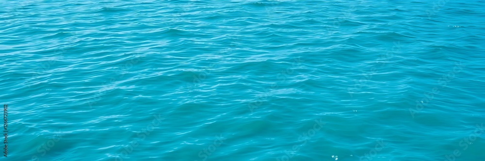 Close-up shot of delicate tiny waves gently lapping in the center of the frame, peaceful, tranquil, aqua Close-up shot of delicate tiny waves gently lapping in the center of the frame, peaceful, tranquil, aqua