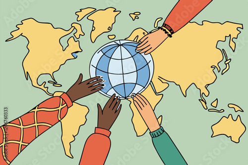  Photograph of a diverse group of people from around the world holding a small blue and white globe in the center, with their hands outstretched towards the globe. The people are wearing colorful cl