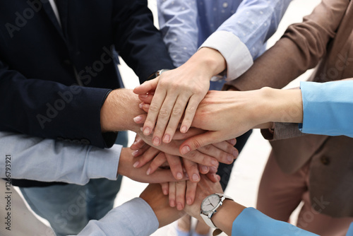 Wallpaper Mural Teamwork. Group of people joining hands together indoors, closeup Torontodigital.ca