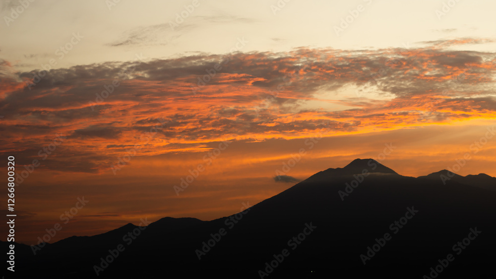 Glowing Horizon Over Mountain Ranges at Sunrise Glowing Horizon Over Mountain Ranges at Sunrise