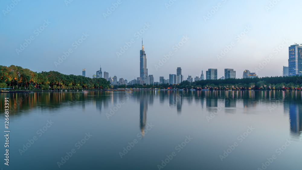 Serene Lake Reflection with Urban Skyline at Dusk Serene Lake Reflection with Urban Skyline at Dusk