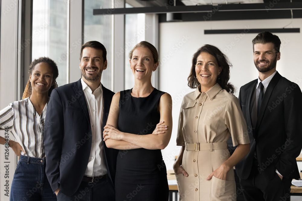 Diverse corporate members, executives, managers represent company posing at workplace. Five multiracial businesspeople standing together in office, exuding professionalism, unity and business success Diverse corporate members, executives, managers represent company posing at workplace. Five multiracial businesspeople standing together in office, exuding professionalism, unity and business success
