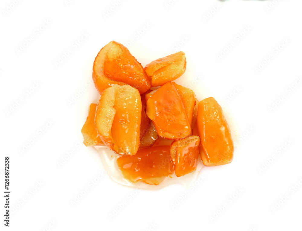 Orange peel preserve isolated on white background. From traditional Turkish cuisine; Orange peel jam (Turkish name; Portakal kabugu receli). Glyko- koutaliou- portokali. Orange peel preserve isolated on white background. From traditional Turkish cuisine; Orange peel jam (Turkish name; Portakal kabugu receli). Glyko- koutaliou- portokali.