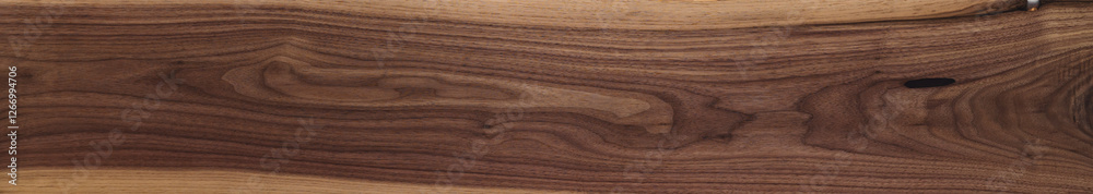 Black walnut wood texture of long solid board untreated Black walnut wood texture of long solid board untreated