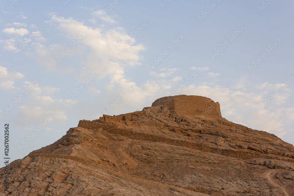 Towers of silence are squat circular walled stone structures, inside which bodies of the deceased of Zoroastrians are exposed to birds who eat the flesh. Yazd, Iran.