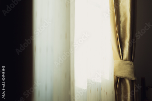 beautiful golden curtain scene, Windows and curtain walls, light and shadow of the evening climate, warm tones that shine through the inner silk curtains or curtains.
