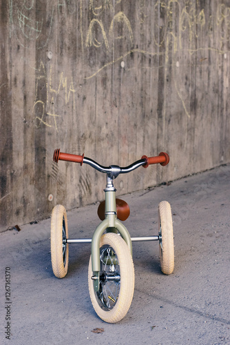 Small cute green tricycle. 