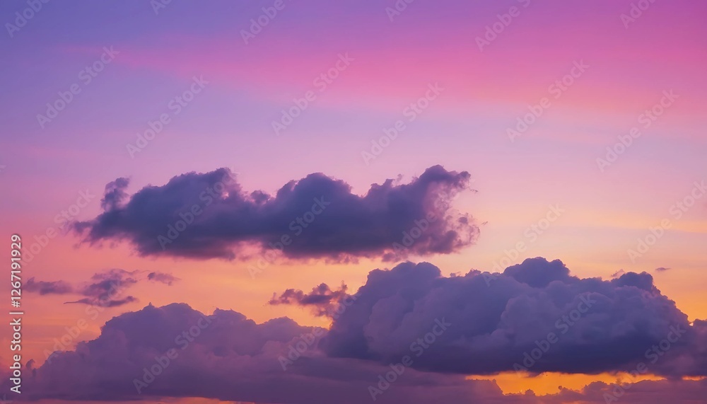 Fototapeta premium Abstract sunset sky with vibrant orange and pink hues, featuring dramatic cloud formations