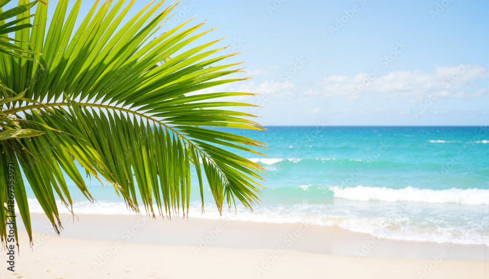 Fototapeta premium Palm leaves against turquoise ocean and sandy beach