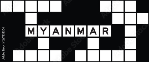 Alphabet letter in word myanmar on crossword puzzle background