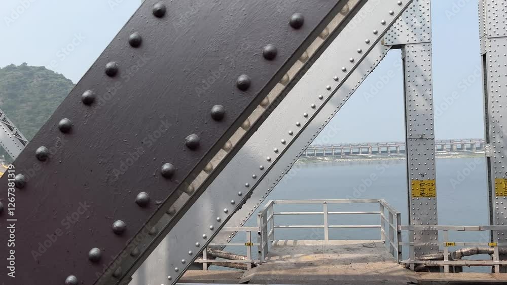 railway bridge over the river, running train over Krishna River in Vijayawada, Amaravati railway bridge over the river, running train over Krishna River in Vijayawada, Amaravati