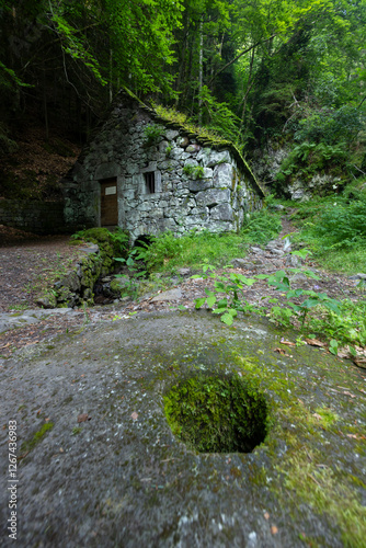 Water wheel mill (Moulin de Chambeuil), Laveissiere, Cantal, Auvergne-Rhone-Alpes, France photo