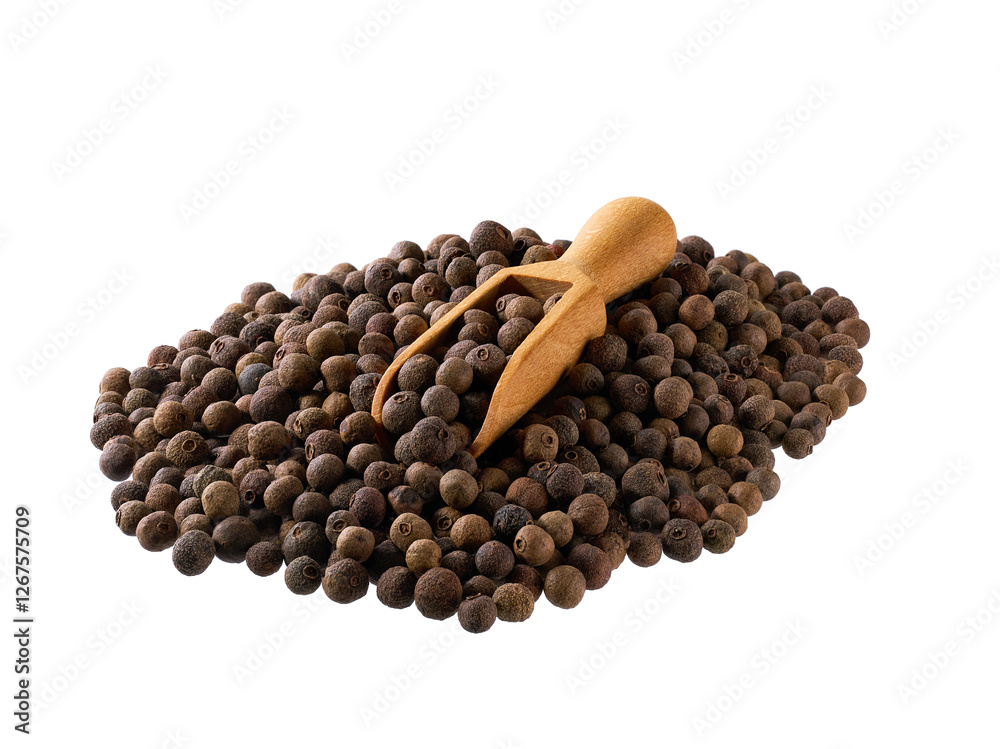 Obraz premium allspice or Jamaican pepper in a wooden serving scoop isolated on white background.