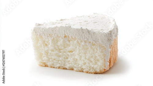 Delicious slice of fluffy white cake topped with creamy frosting ready to be enjoyed at a celebration photo