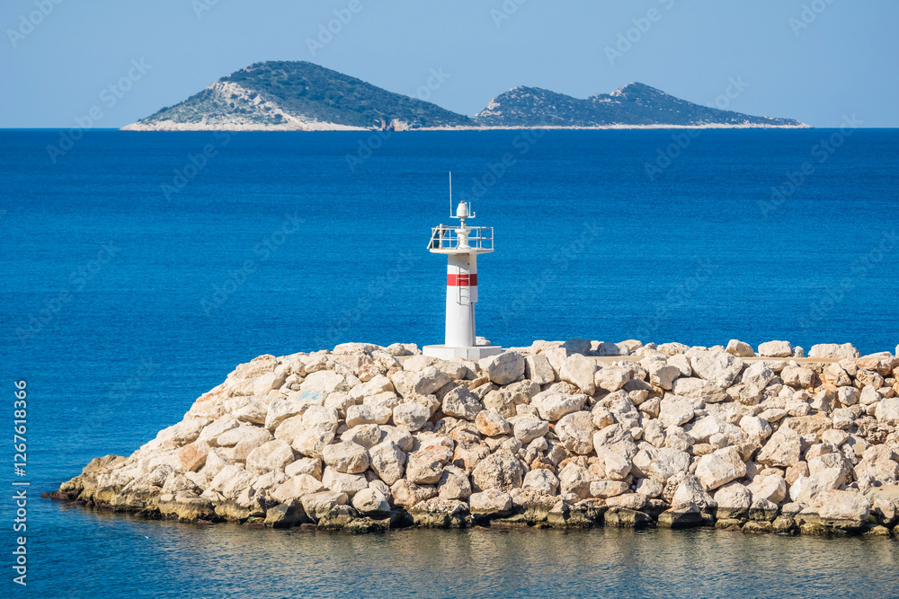 Lighthouse in the Mediterranean sea in Kalkan, Turkey
