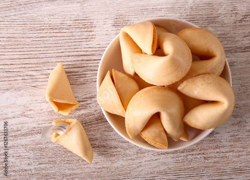 Fortune cookies, over wooden table