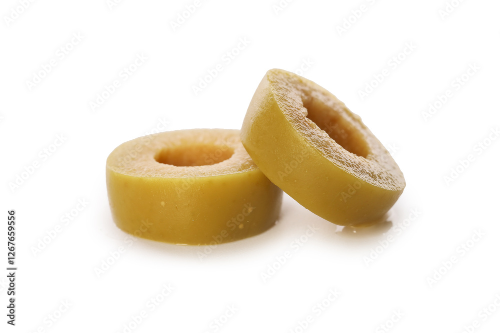 Slices of delicious marinated green olive isolated on white Slices of delicious marinated green olive isolated on white