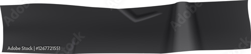 Black insulating tape is unfolding and creating a curved shape on a white background, creating a contrast and highlighting the texture of the material
