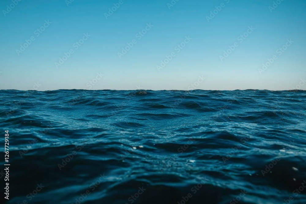 Ocean wave ripple in the open sea under clear sky for calm nature background Ocean wave ripple in the open sea under clear sky for calm nature background