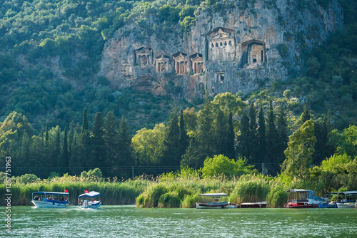 Ancient tombs carved in a cliff near Dalyan, Turkey photo