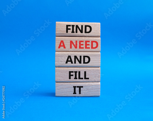 Wallpaper Mural Fill the need symbol. Concept word Find a Need and Fill it on wooden blocks. Beautiful blue background. Business and Fill the need concept. Copy space Torontodigital.ca