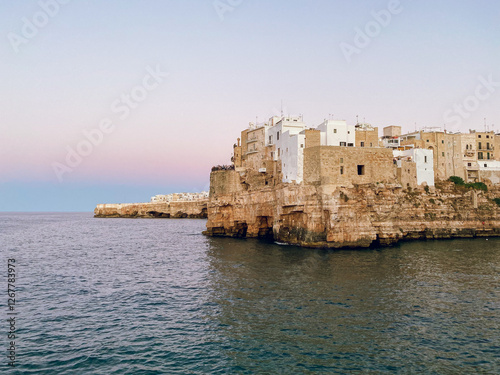 Sunset at Polignano a Mare with panoramic sunset, Puglia, Southern Italy