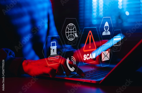 Scam Alert Warning with Cybersecurity Icons. Man holding smartphone while using laptop, warning sign for scams with icons online threats, phishing, cybersecurity, Unknown person, suspicious scammer,