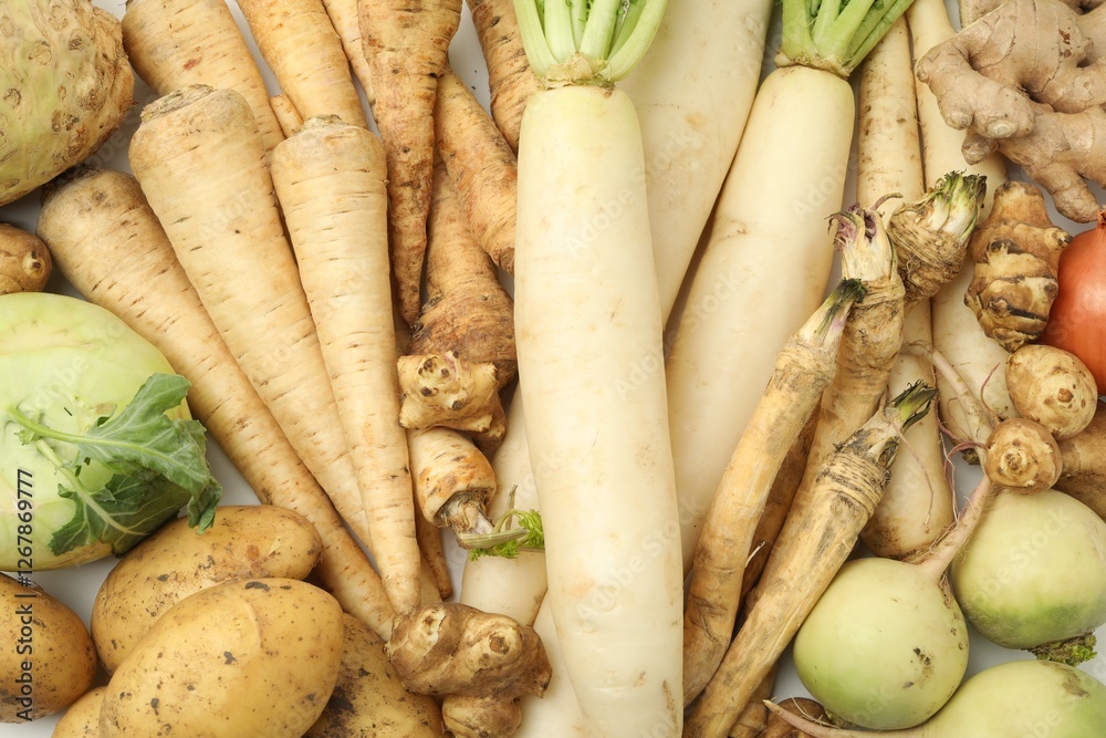 Many different root vegetables as background, top view Many different root vegetables as background, top view