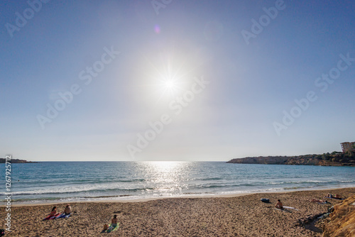 Fototapeta Naklejka Na Ścianę i Meble -  Sunny beach with shimmering sea in Paphos, Cyprus