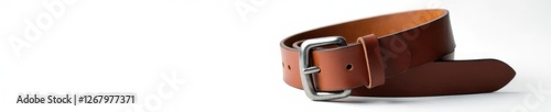 White background with silver buckle and rolled leather belt, texture, belt