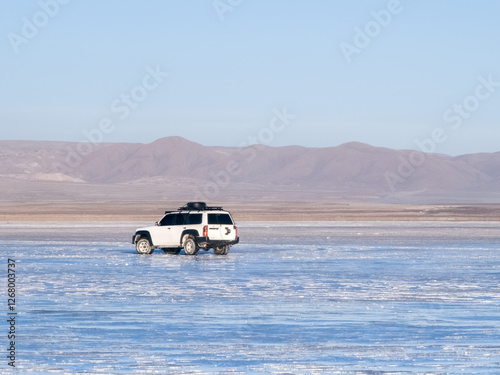 Car in Salar de Uyuni. Salt flat in Bolivia